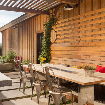 Farm style outdoor kitchen and dining area.