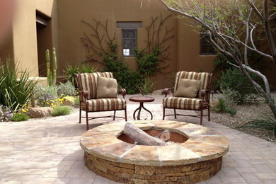 This is an example of a patio in Phoenix with a fire feature.