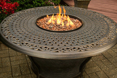 Inspiration for a large contemporary patio remodel in Philadelphia with a fire pit