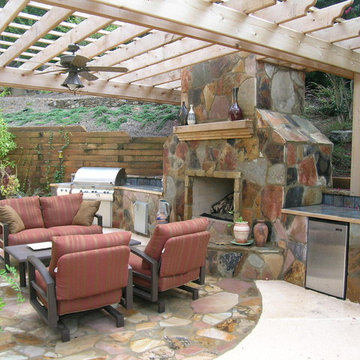 Fireplace with Pergola and outdoor kitchen