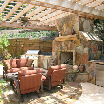 Fireplace with Pergola and outdoor kitchen