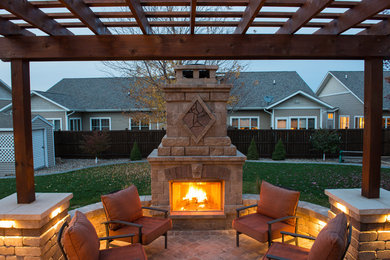 Patio - patio idea in Other with a fire pit