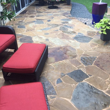 Flagstone patio, basalt and pondless water feature