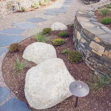 Flagstone Walkway with Stacked Basalt Retaining Walls + Granite Boulders