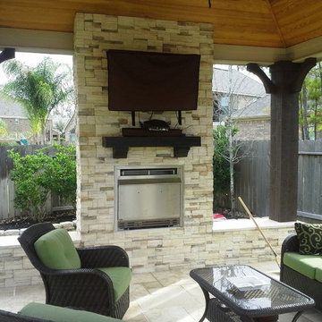 Free-standing patio cover w/ gas fireplace