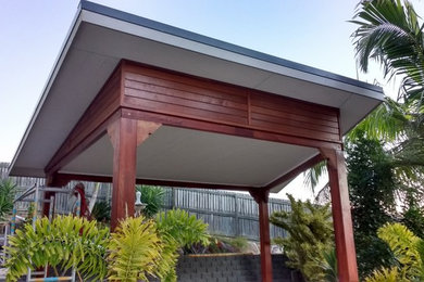 This is an example of a modern patio in Gold Coast - Tweed.