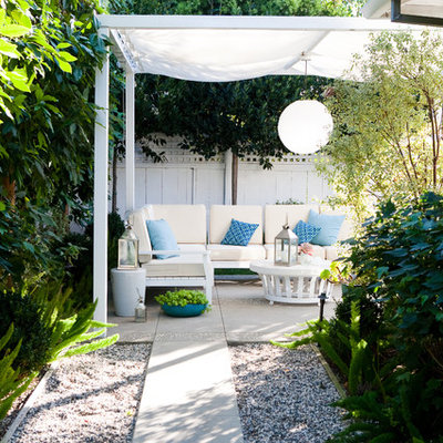 Elegant patio photo in Los Angeles with a gazebo