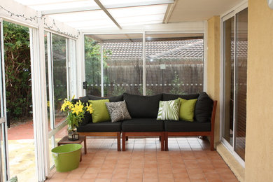 From Depressing to Cheerful: Our $2000 Sunroom Makeover