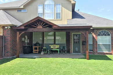 Patio - rustic backyard patio idea in Dallas