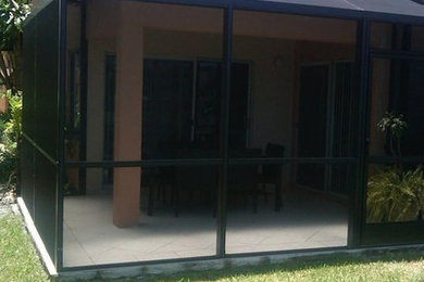 Patio - traditional backyard patio idea in Miami