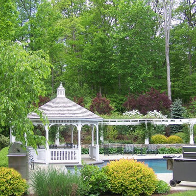 Patio - traditional backyard patio idea in New York with a gazebo