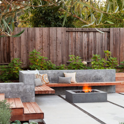 Inspiration for a contemporary backyard patio remodel in San Francisco with a fire pit
