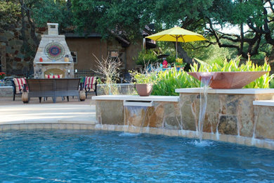 Example of an arts and crafts patio design in Austin