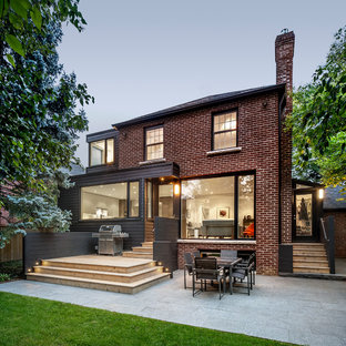 Immagine di un patio o portico minimal dietro casa con graniglia di granito e nessuna copertura
