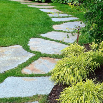 Goshen stone steppers, plantings and low voltage lighting.