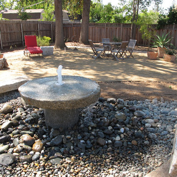 Granite Millstone Water Feature and Seating Area on Decomposed Granite