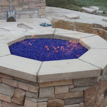 Great Flagstone Patio and Outdoor Kitchen with a Great Gas Fire Pit