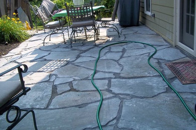 Example of a classic patio design in Other