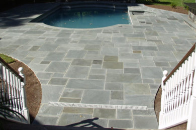 Example of a backyard patio design in New York