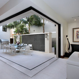 Trendy courtyard patio photo in Orange County with no cover