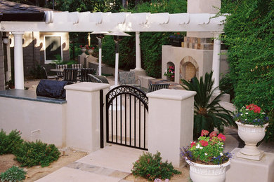 Esempio di un patio o portico tradizionale