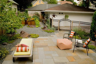 Inspiration for a contemporary courtyard patio remodel in Minneapolis