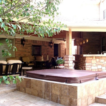 Houston covered patio with outdoor bar, fire pit and entertaining space