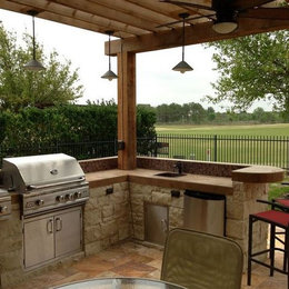https://www.houzz.com/hznb/photos/houston-patio-addition-with-double-pergola-outdoor-kitchen-and-travertine-tile-transitional-patio-houston-phvw-vp~52017963