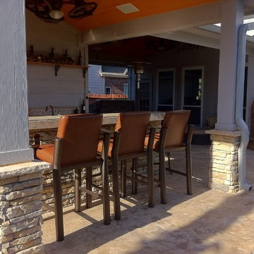 Houston rustic outdoor bar and grill area