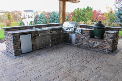 Huge Outdoor Kitchen with Stone Paver Patio