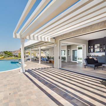 Indoor-Outdoor Pool House Created with Two AG Millworks Accordion Doors