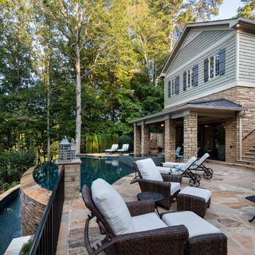 Infinity Edge Pool with Knife Edge Spa and Pool House