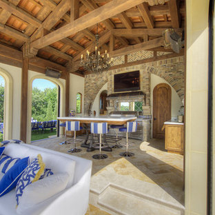 Tuscan backyard tile patio kitchen photo in Minneapolis with a gazebo
