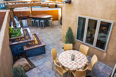 Example of a southwest patio design in Denver