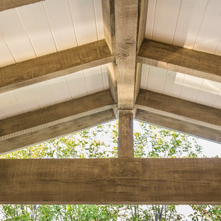 Inspiration for a mid-sized timeless backyard patio kitchen remodel in Los Angeles with decking and a roof extension
