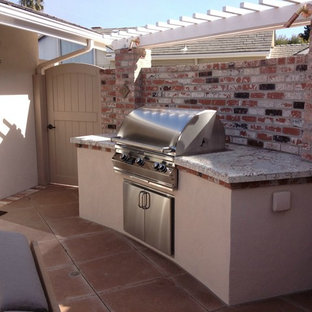 Example of a mid-sized eclectic patio kitchen design in San Diego