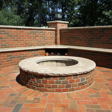 Lake Forest, IL Brick patio with a fire pit and brick seat and privacy walls
