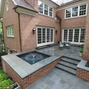 Lake Forest, IL Spa with brick walls and stone patio