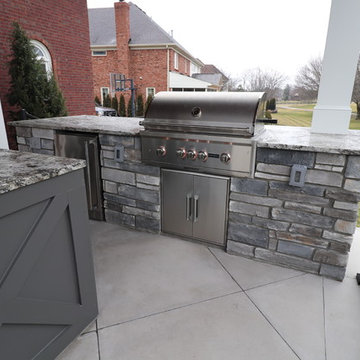 Lake Forest Outdoor Living Stone Patio with 2 Roof Structures