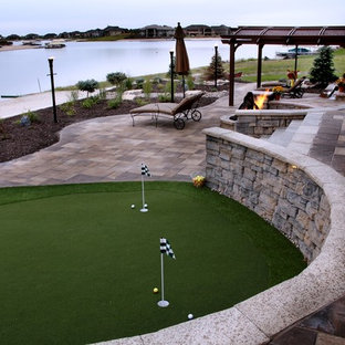 Example of an arts and crafts patio design in Omaha