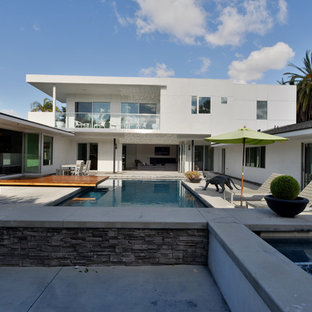 Mid-sized minimalist backyard concrete patio photo in Los Angeles with no cover