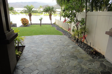 Design ideas for a large world-inspired back patio in Hawaii.
