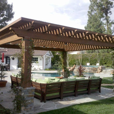 Trendy patio photo in Los Angeles with a pergola