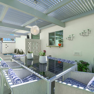 Patio - traditional patio idea in Los Angeles with a pergola