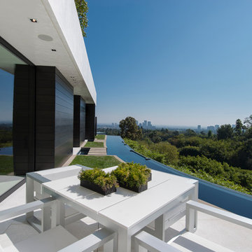Laurel Way Beverly Hills modern home luxury wraparound swimming pool with dining