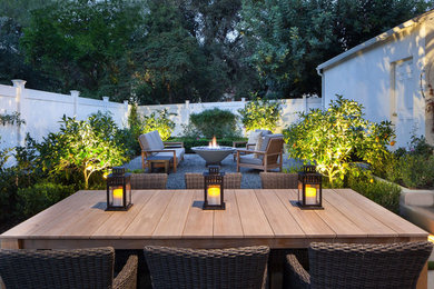 Patio - mid-sized traditional backyard gravel patio idea in Los Angeles with a fire pit and no cover