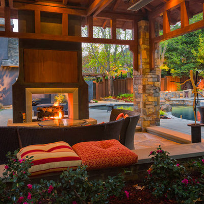 Patio - contemporary patio idea in San Francisco with a fire pit and a gazebo