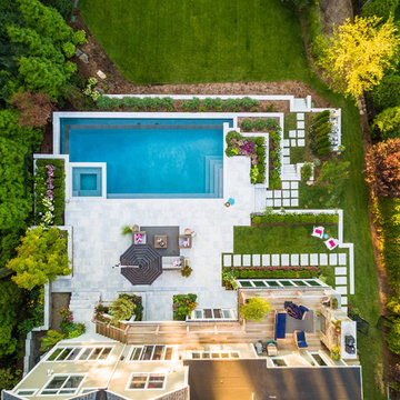 Luxury vanishing edge swimming pool and outdoor living area Ridgewood NJ