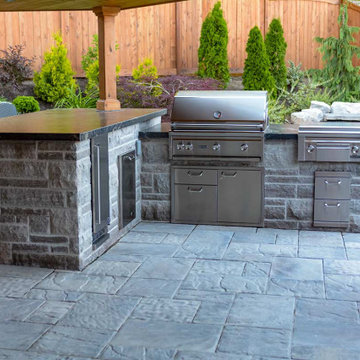 Landscaping design with outdoor patio, outdoor kitchen & driveway