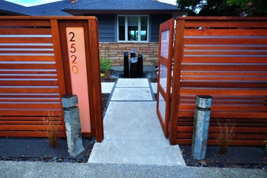 Inspiration for a mid-sized zen backyard concrete patio fountain remodel in Seattle with no cover